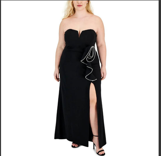 Elegant evening black dress with beautiful embellished flower
